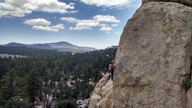 image of someone climbing a boulder on Big Bear Mountain