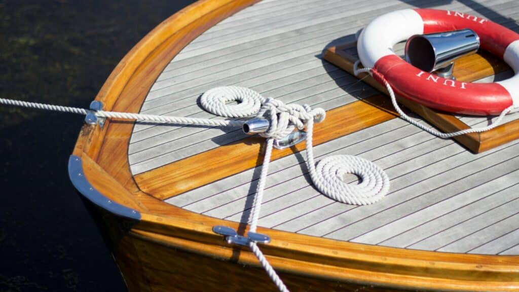 A boat tied to a dock